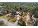 Aerial view of a house and surrounding land at 25888 Whipperwill St, Brooksville, FL 34601