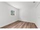 Bright bedroom with new flooring and ample closet space at 25888 Whipperwill St, Brooksville, FL 34601