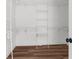 Spacious walk-in closet with ample shelving and hanging space at 25888 Whipperwill St, Brooksville, FL 34601