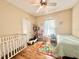 bedroom with crib and toys at 262 Pryor St, Brooksville, FL 34601