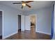 Bright bedroom with wood floors and ample closet space at 2701 W Cordelia St, Tampa, FL 33607