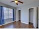 Spacious bedroom with hardwood floors and double closets at 2701 W Cordelia St, Tampa, FL 33607