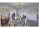 Open concept dining area with hardwood floors and chandelier at 2701 W Cordelia St, Tampa, FL 33607