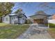House exterior with carport and grassy yard at 2701 W Cordelia St, Tampa, FL 33607