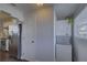 Stackable washer and dryer in a well-lit laundry room at 2701 W Cordelia St, Tampa, FL 33607