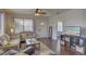 Living room features hardwood floors, a sofa and a TV at 2701 W Cordelia St, Tampa, FL 33607