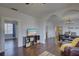 Living room with hardwood floors and open concept to dining area at 2701 W Cordelia St, Tampa, FL 33607
