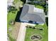 Single-story house with a gray roof and landscaped yard at 289 Monte Cristo Blvd, St Petersburg, FL 33715