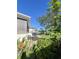 Spacious backyard with lush lawn and patio seating at 289 Monte Cristo Blvd, St Petersburg, FL 33715