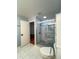 Modern bathroom with walk-in shower and updated toilet at 289 Monte Cristo Blvd, St Petersburg, FL 33715