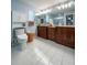 Double vanity bathroom with updated fixtures and tile floors at 289 Monte Cristo Blvd, St Petersburg, FL 33715