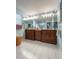 Updated bathroom with double vanity and modern lighting at 289 Monte Cristo Blvd, St Petersburg, FL 33715