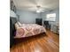 Bedroom with wood floors and ceiling fan at 289 Monte Cristo Blvd, St Petersburg, FL 33715