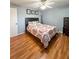 Bedroom with wood floors and ceiling fan at 289 Monte Cristo Blvd, St Petersburg, FL 33715