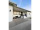 Small patio with seating, steps, and a front entrance at 289 Monte Cristo Blvd, St Petersburg, FL 33715