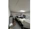 Attached garage with storage shelving at 289 Monte Cristo Blvd, St Petersburg, FL 33715