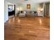 Living room with hardwood floors and sectional sofa at 289 Monte Cristo Blvd, St Petersburg, FL 33715