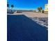 Empty parking lot with a view of the water and some cars at 289 Monte Cristo Blvd, St Petersburg, FL 33715