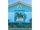 The Island Grille building exterior with teal walls and tropical plants at 289 Monte Cristo Blvd, St Petersburg, FL 33715