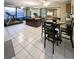Screened porch with office space and view of backyard at 289 Monte Cristo Blvd, St Petersburg, FL 33715