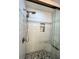 Large walk-in shower with pebble floor and built-in shelf at 289 Monte Cristo Blvd, St Petersburg, FL 33715