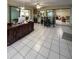 Bright sunroom features tile flooring, and views to the backyard at 289 Monte Cristo Blvd, St Petersburg, FL 33715