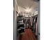 Large walk-in closet with built-in shelving and rods at 289 Monte Cristo Blvd, St Petersburg, FL 33715