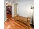 Walkway with bench leading to a large walk-in closet at 289 Monte Cristo Blvd, St Petersburg, FL 33715