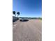 Parking lot with a car and a stunning waterfront view at 289 Monte Cristo Blvd, St Petersburg, FL 33715