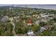 Property location shown from above with a view of surrounding houses and the bay at 2932 W Alline Ave, Tampa, FL 33611