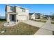 Two-story house with a two-car garage at 38311 Sonnet Landing Ave, Zephyrhills, FL 33540