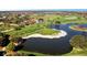 Aerial view of golf course community at 4098 Las Palmas Way, Sarasota, FL 34238
