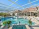 Inviting pool with spa and screened enclosure at 4098 Las Palmas Way, Sarasota, FL 34238