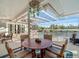 Outdoor patio with dining area and pool view at 4098 Las Palmas Way, Sarasota, FL 34238