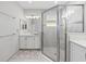 Spa-like bathroom featuring a walk-in shower and updated vanity at 4719 Avila Lakes Dr, Wimauma, FL 33598