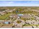 Resort-style community pool with expansive deck and parking at 4719 Avila Lakes Dr, Wimauma, FL 33598