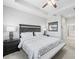 Spacious Primary bedroom with king bed and ensuite bathroom at 4719 Avila Lakes Dr, Wimauma, FL 33598