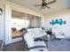 Relaxing patio with outdoor seating and view of backyard at 4719 Avila Lakes Dr, Wimauma, FL 33598