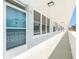 Condo hallway with light blue walls and white trim at 4880 Locust Ne St # 227, St Petersburg, FL 33703