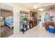 Kitchen with breakfast bar and view into bedroom at 4880 Locust Ne St # 227, St Petersburg, FL 33703