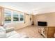 Spacious living room with laminate flooring and a neutral color scheme at 4880 Locust Ne St # 227, St Petersburg, FL 33703