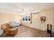 Living room features laminate flooring, and neutral decor at 4880 Locust Ne St # 227, St Petersburg, FL 33703