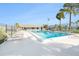 Community pool with lounge chairs and surrounding landscaping at 4880 Locust Ne St # 227, St Petersburg, FL 33703