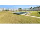 Outdoor shuffleboard court with covered seating area at 4880 Locust Ne St # 227, St Petersburg, FL 33703