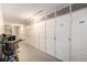 Hallway with multiple storage units at 4880 Locust Ne St # 227, St Petersburg, FL 33703