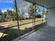 Screened porch overlooking a grassy backyard at 4902 31St S Ave # 109, Gulfport, FL 33707