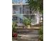 Two-story building with blue stairs and balconies at 4902 31St S Ave # 109, Gulfport, FL 33707
