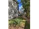 Building exterior showcasing landscaping and a walkway at 4902 31St S Ave # 109, Gulfport, FL 33707