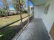 Screened porch overlooking a grassy yard at 4902 31St S Ave # 109, Gulfport, FL 33707