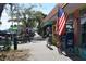 Outdoor scene showing shops and pedestrians on a sunny day at 4902 31St S Ave # 109, Gulfport, FL 33707